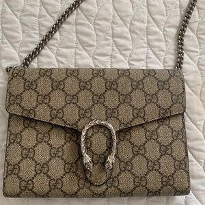 Gucci Supreme mini Dionysus wallet on a chain